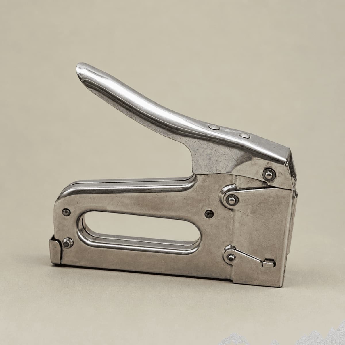 Catalog shot of a staple gun on a clean backdrop